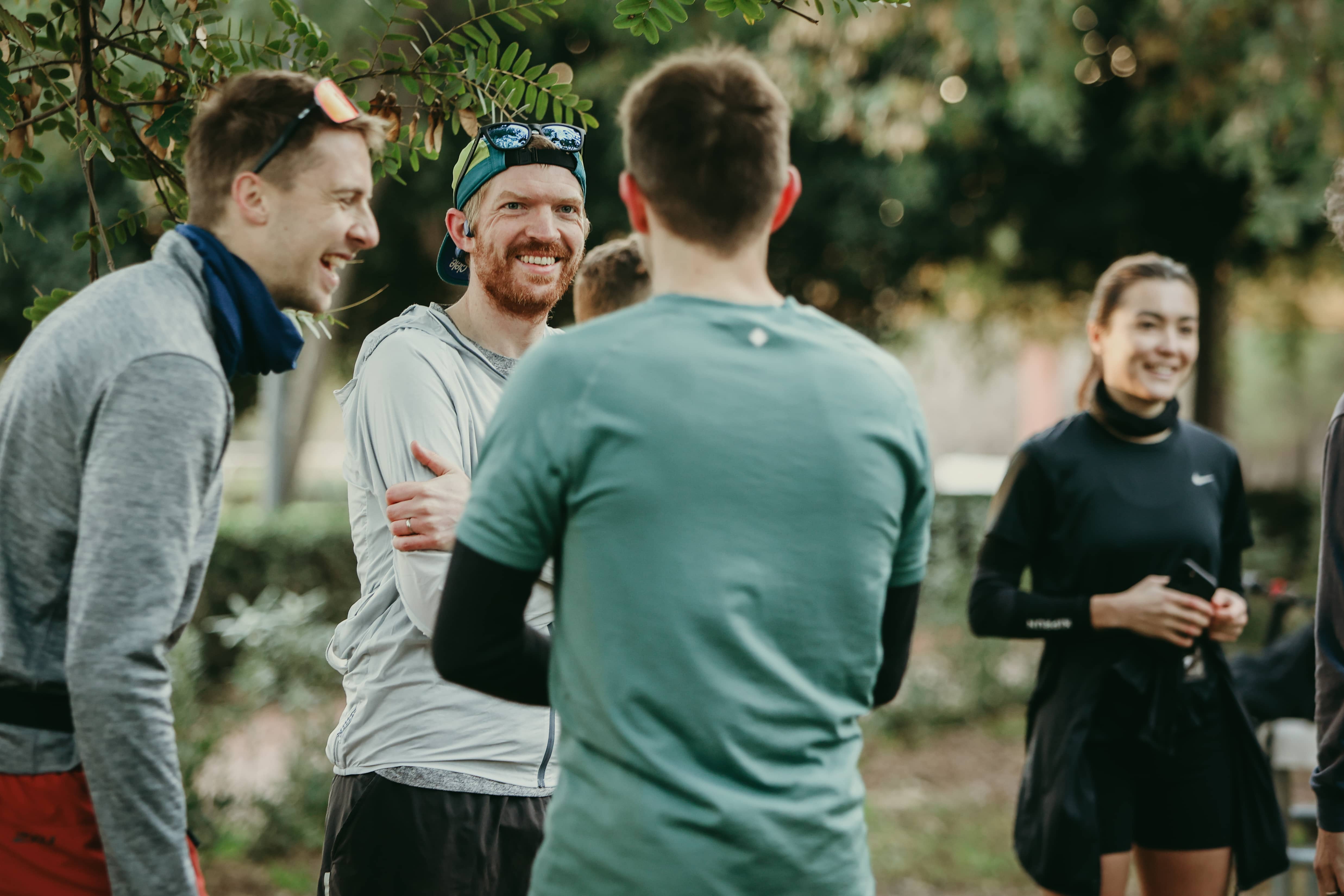 Wide-angle shot of runners running on path