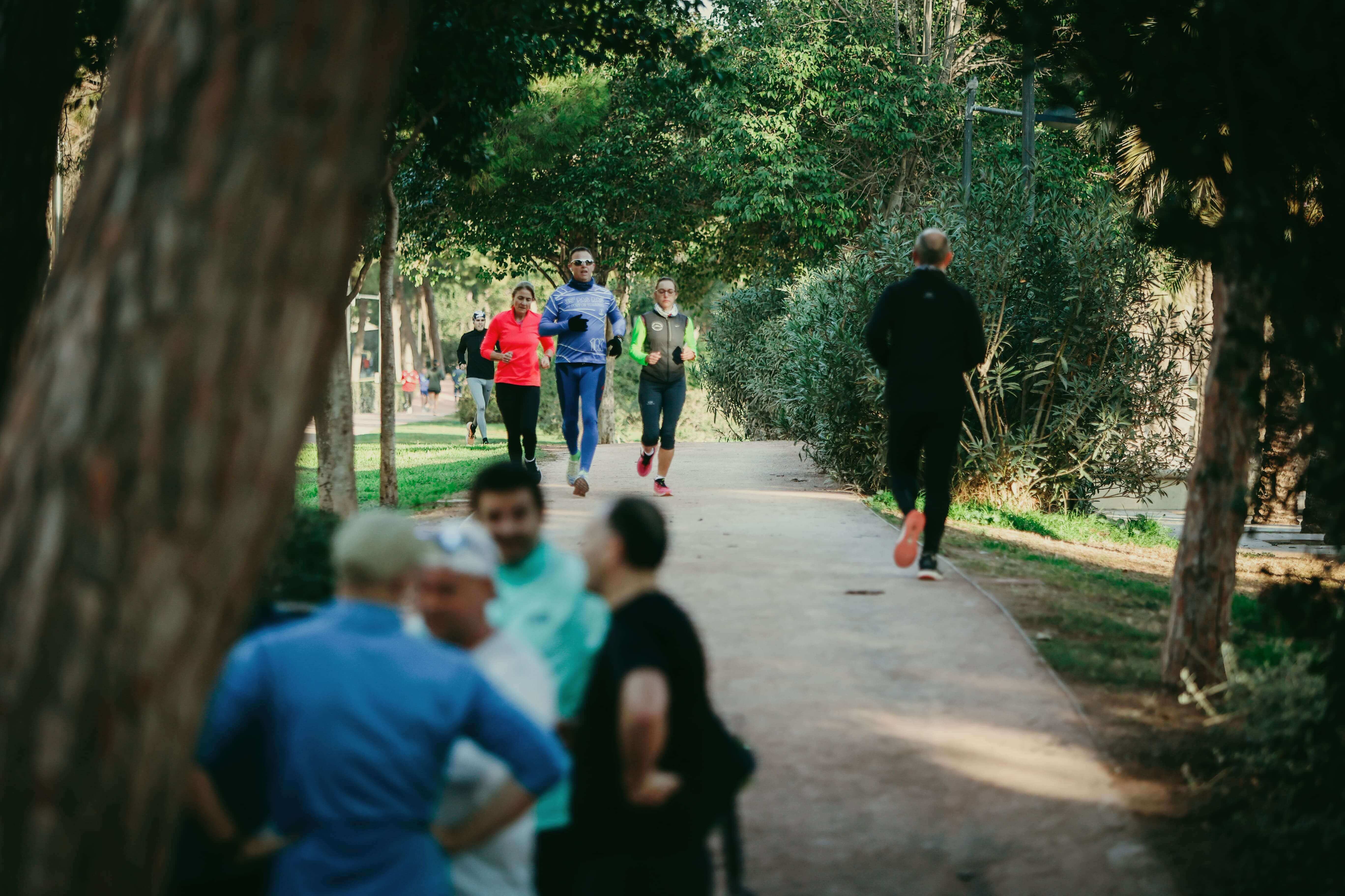 Mixed group chatting in coffee shop
